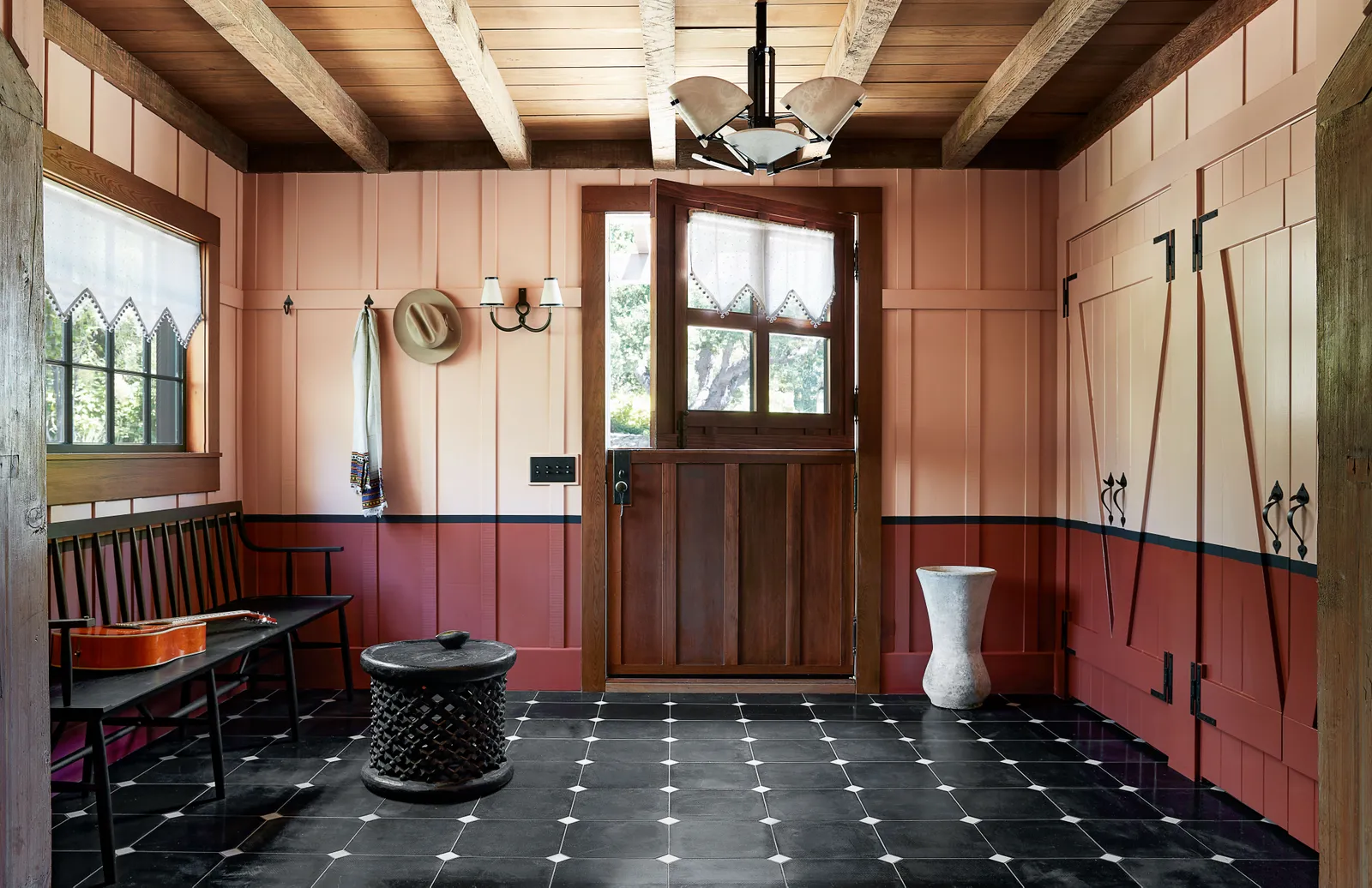 Red monochromatic color palette in rustic entryway. Color theory by Nadine Stay