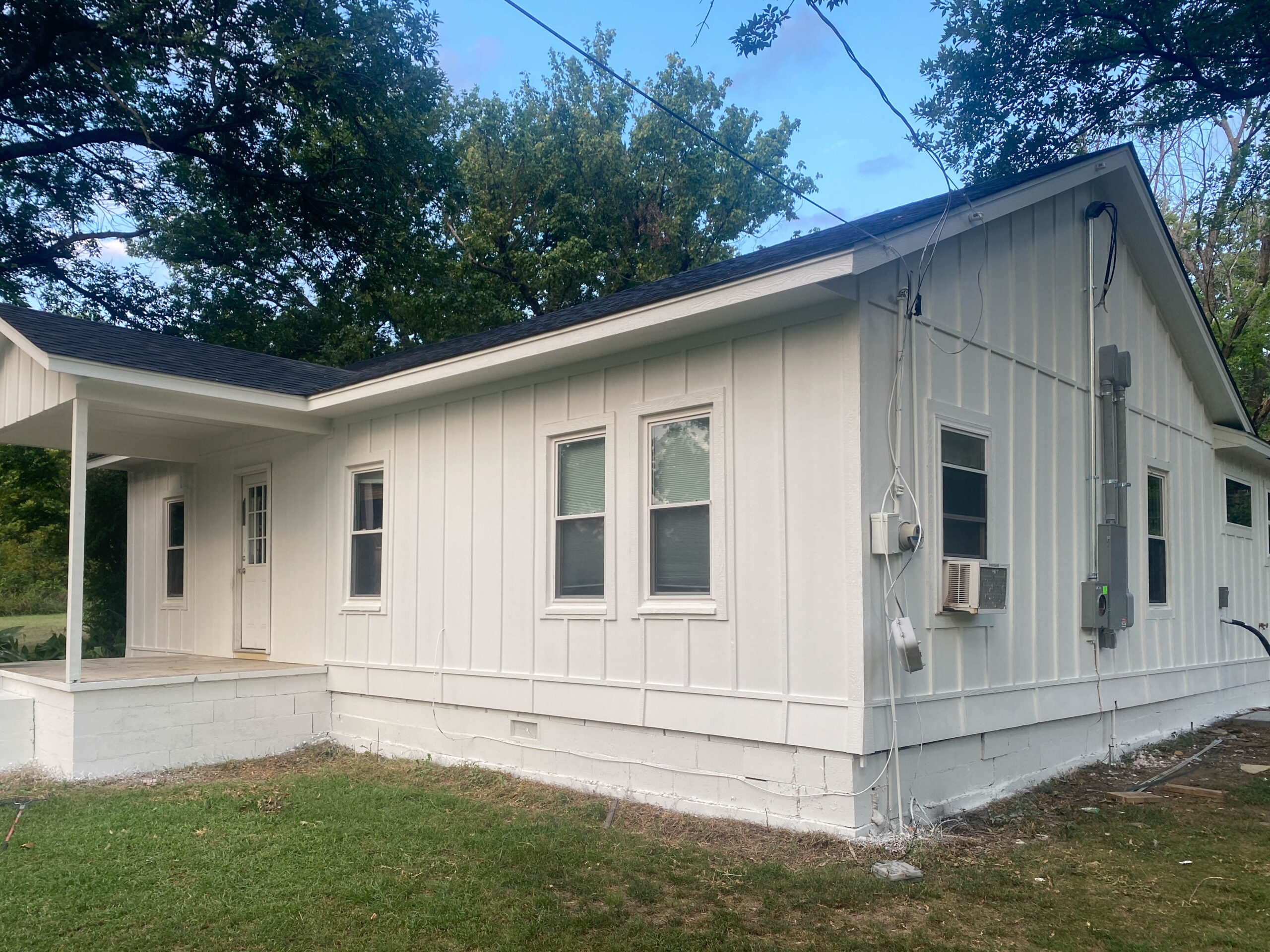 How to add character to an all white exterior home. How to make white exterior less stark.