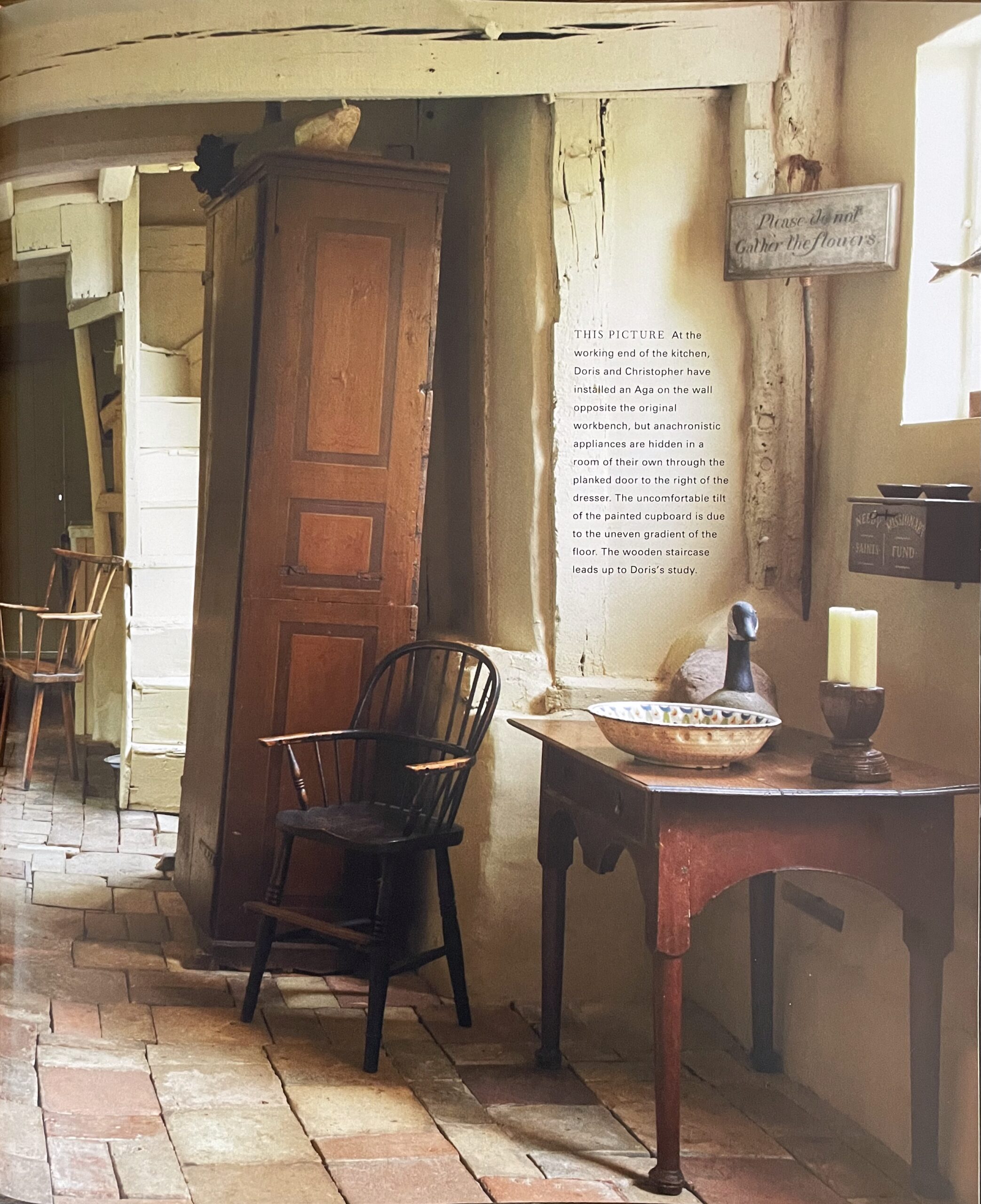 English countryside home in Perfect English Farmhouse book. How to disguise sloped floors.