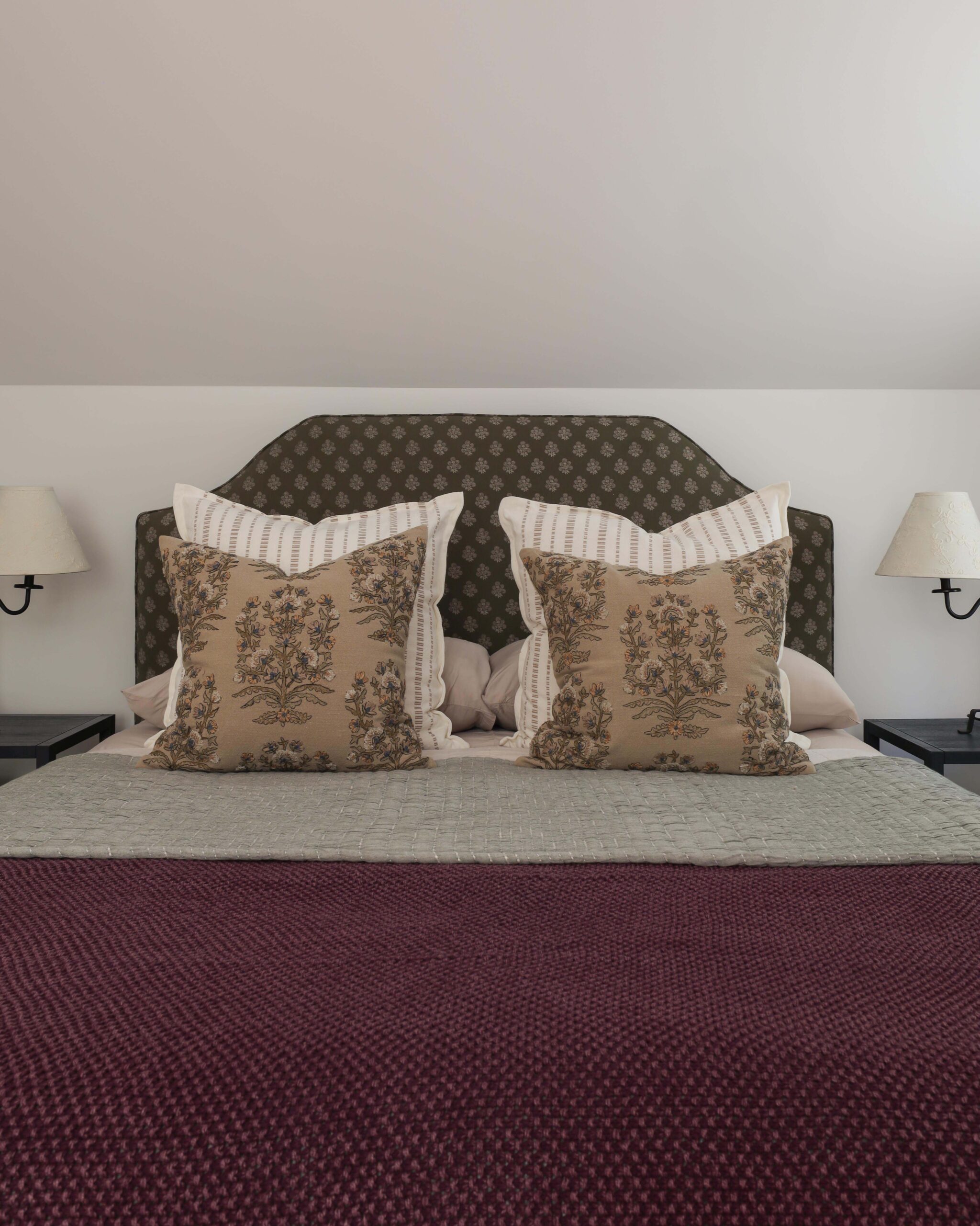 Block printed headboard with golden yellow floral pillows - Nadine Stay