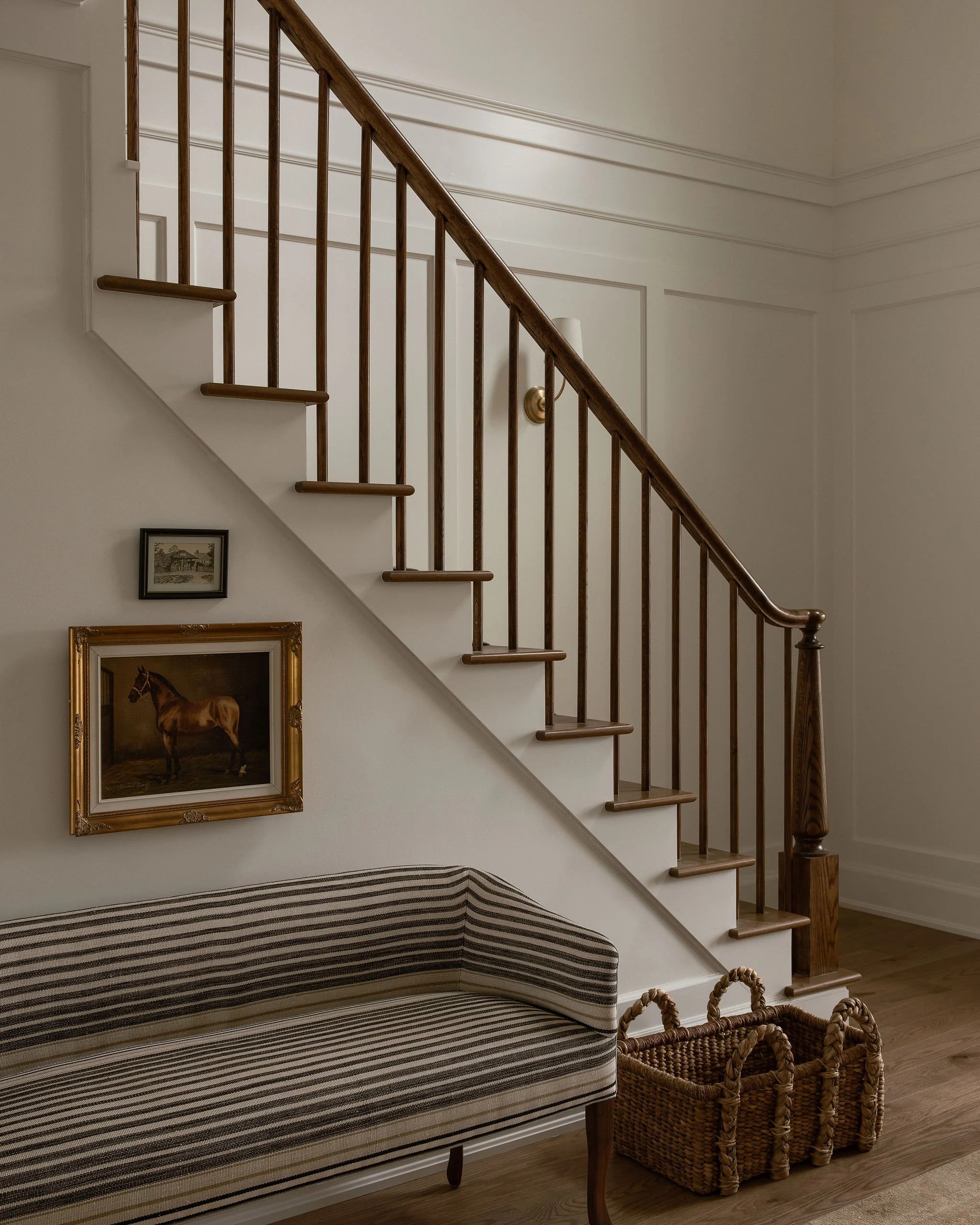 How to design an entryway with two story ceilings. Entry wall paneling. Design by W Design Collective