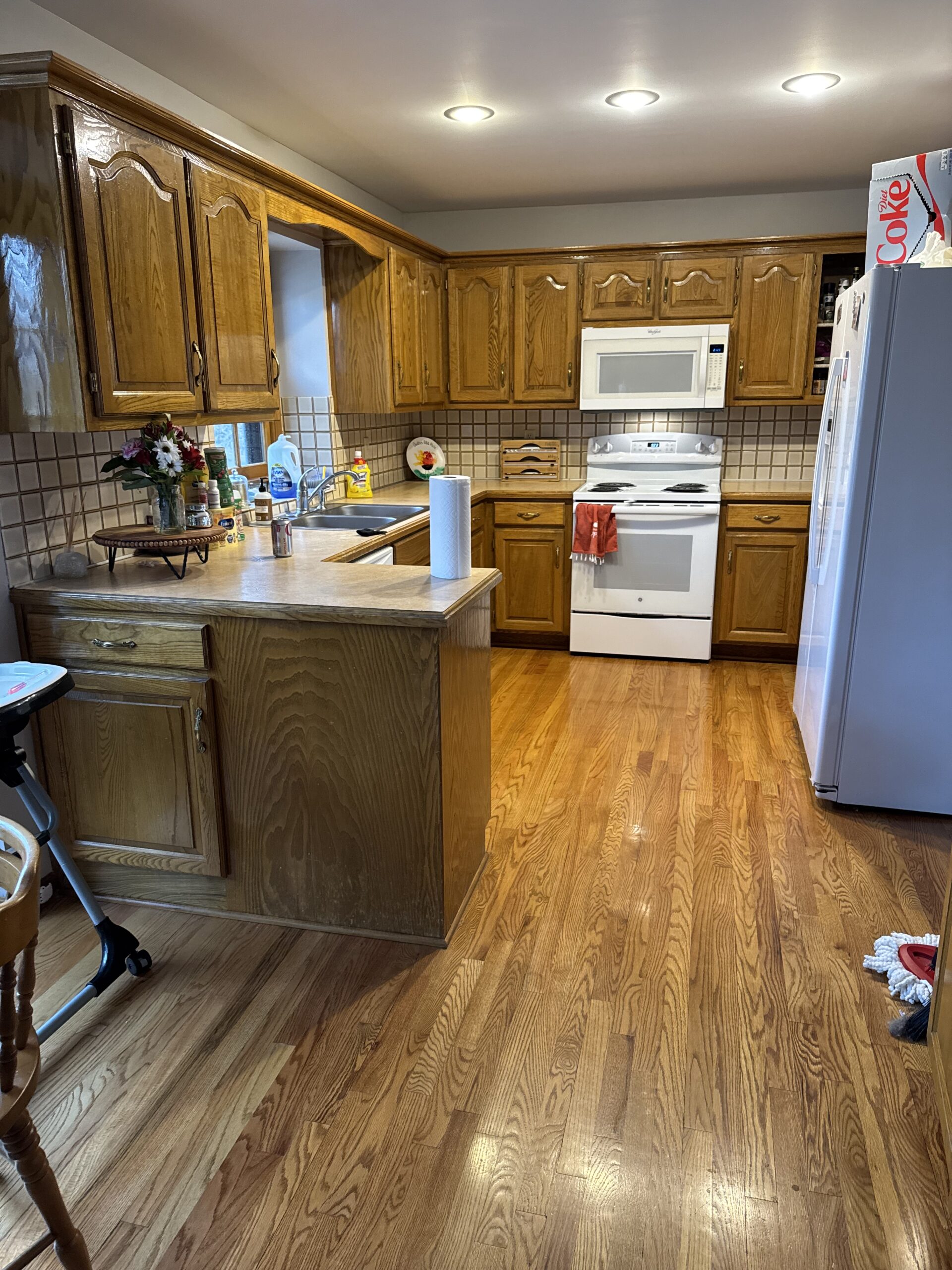 How to update golden oak cabinets in a kitchen without replacing them.