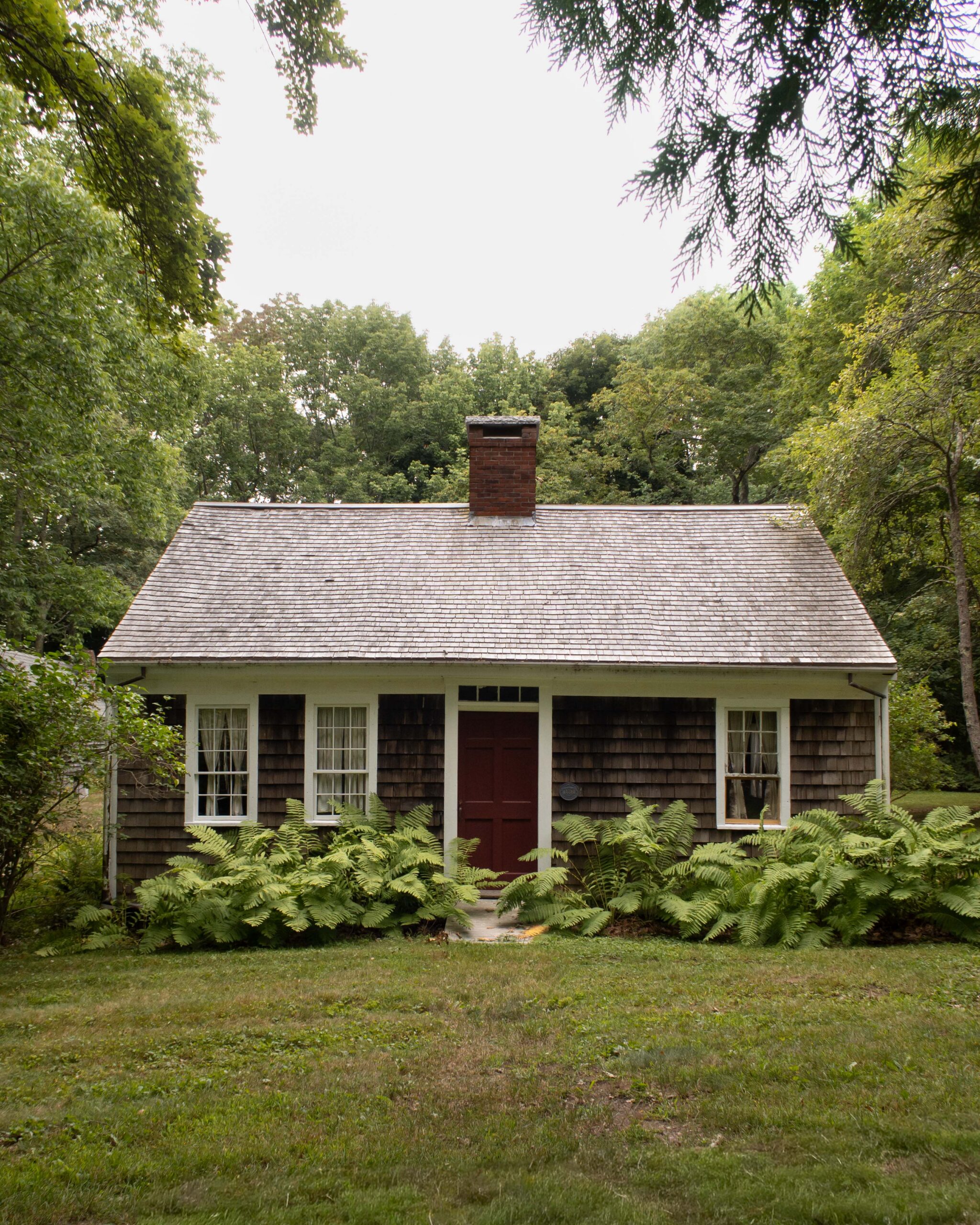 Hall-and-parlor architecture style with cedar shake siding and roof - Nadine Stay